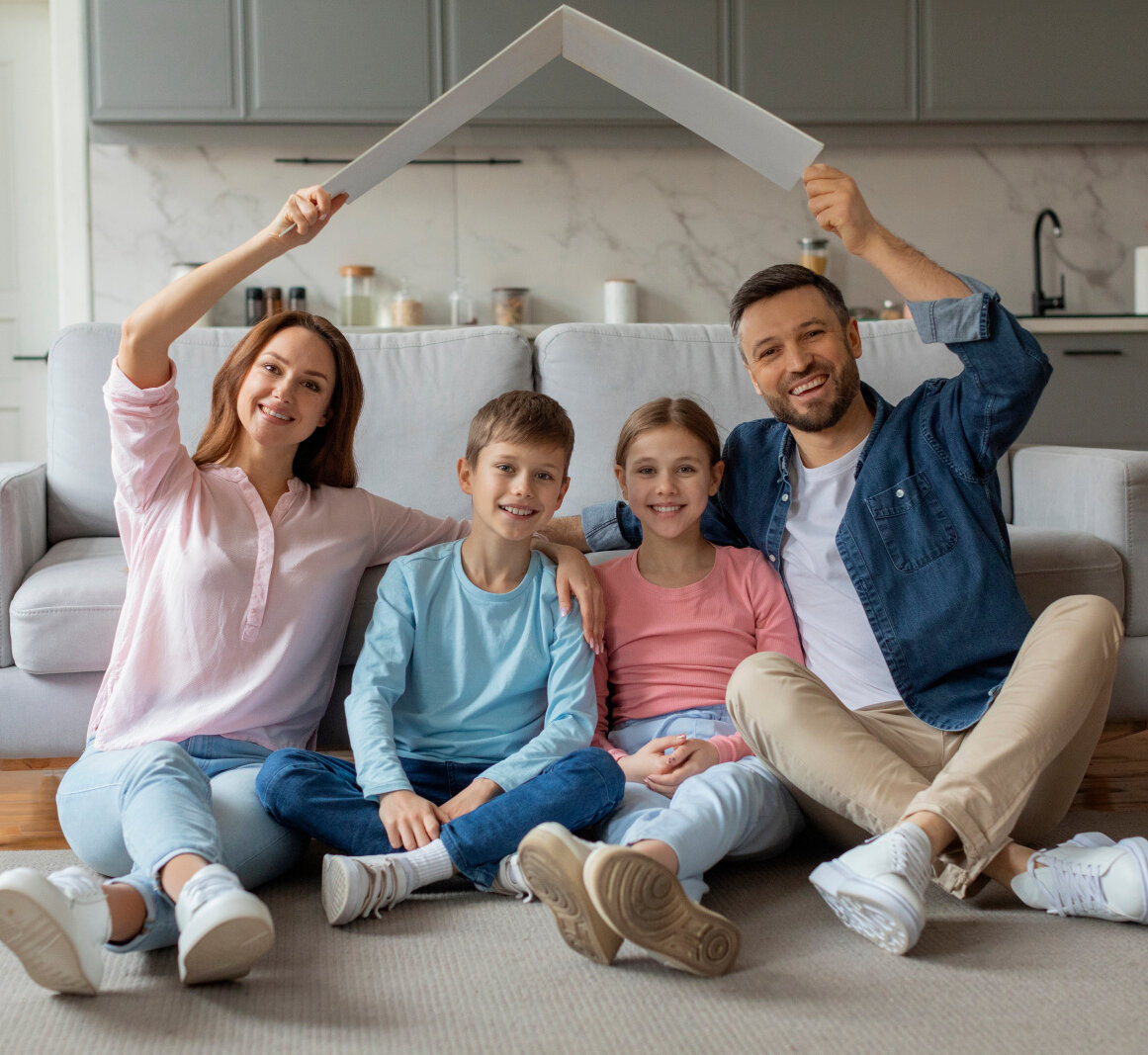 Symbolizing love and the importance of family and home, this european family forms a house shape expressing unity and affection