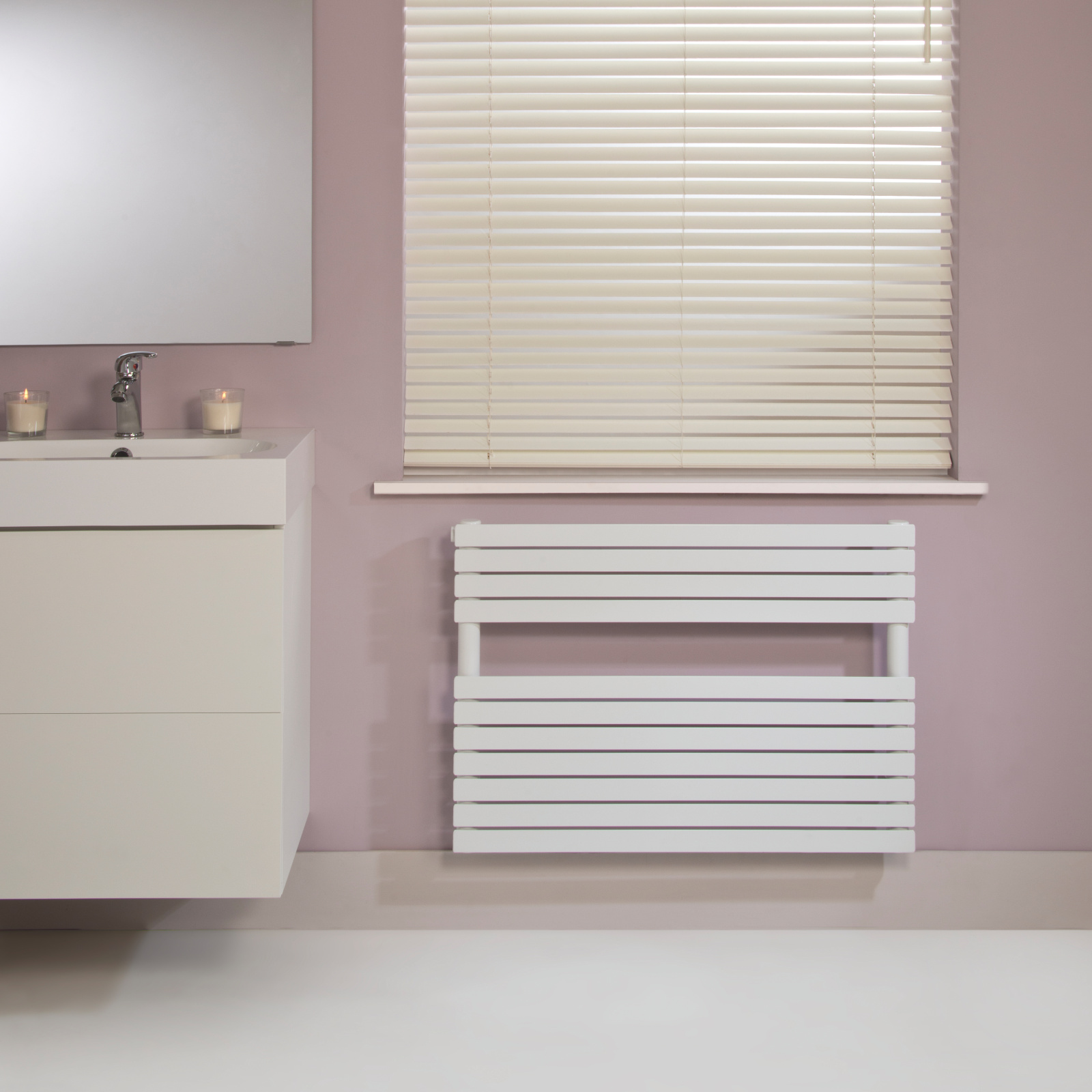 Zehnder_RAD_Ax-Spa_under window room set white_1_print+web Rendering Decorative radiator Front view